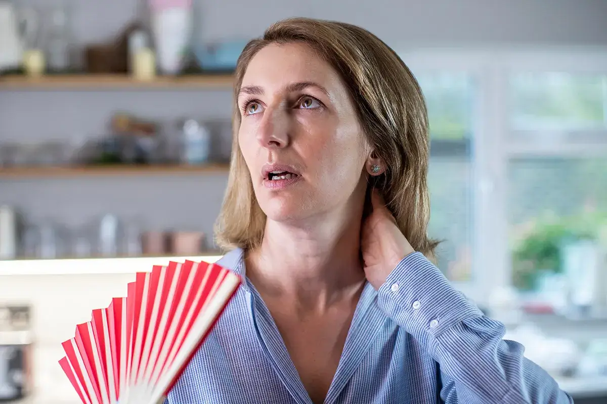 A woman having a hot flash