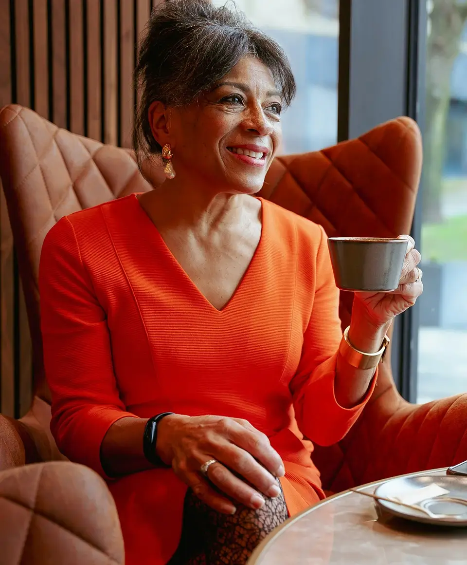 Smiling woman in cafe
